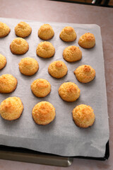 yellow cookies  flowers on a rose background