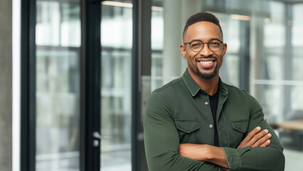 Fototapeta premium A cheerful Black man poses in bright, modern office area Generative AI