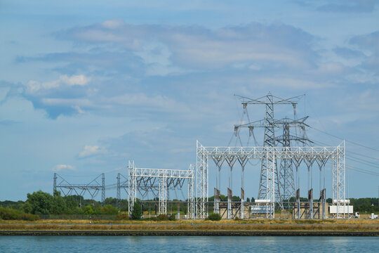 Power line and transformer station by water in the Netherlands