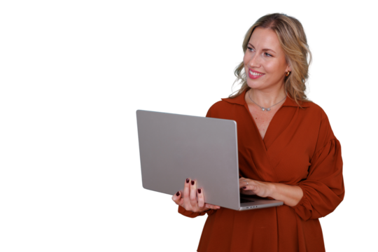 Professional businesswoman holding laptop working remotely, smiling at blank space, a symbol of communication and technology in business