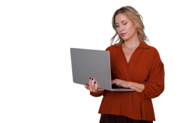Woman holding and typing on laptop, smiling, working remotely, browsing online, business communication concept, transparent background