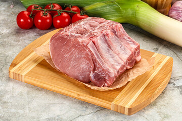 Raw pork loin cut with bone