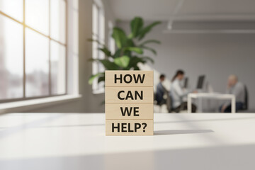 Wooden blocks spell how can we help in an office. Suitable for business presentations, websites, and social media posts for customer service content.