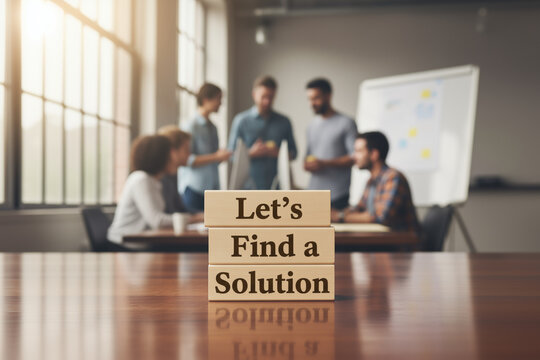 Business meeting and blocks reading lets find a solution. Suitable for presentations, websites, and social media content related to business strategy, problem solving, teamwork, and collaboration - Powered by Adobe