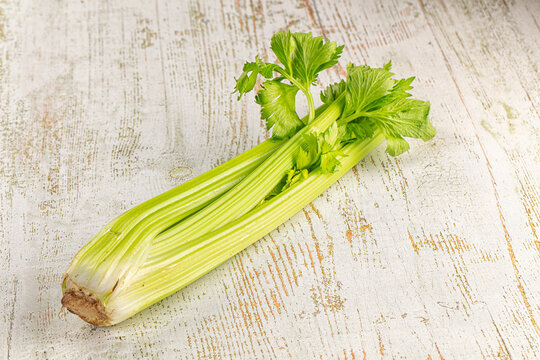 Raw green selery stem with leaves