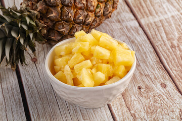 Sweet canned pineapple fruit pieces