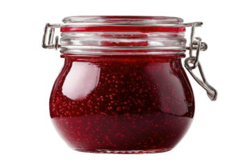 Jar of bright red berry jam with visible fruit pieces
