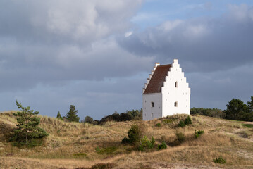 Tower of Den Tilsandede Kirke, a churche buried by sand drifts, located in Skage, Denmark.
