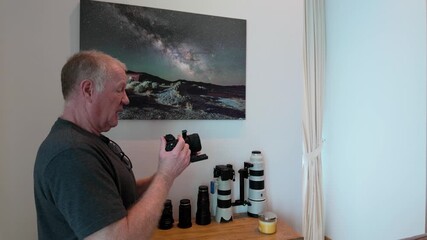 An experienced photographer shares insights on capturing stunning nightscapes, with a display of various camera lenses and a captivating Milky Way photo in the background.