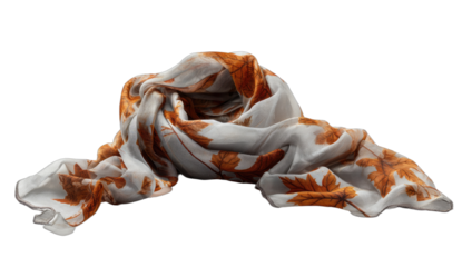 White silk scarf with scattered orange autumn leaf patterns, casually draped