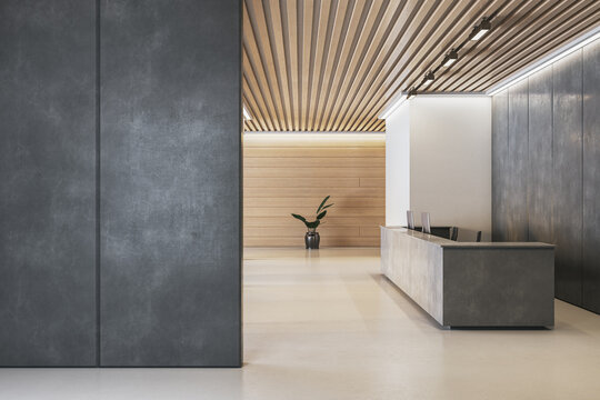 Modern corporate reception area with minimalist desk and wooden ceiling slats in clean, contemporary office interior space design template mockup. 3D Rendering