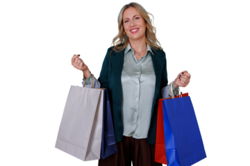 Happy woman holding colorful shopping bags having satisfied retail experience, consumerism, and purchasing on transparent background