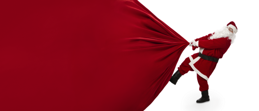 Santa Claus pulling huge bag of presents isiolated on transparent background with copy space, png file