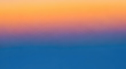 Gradient of orange, pink, purple and blue colors in a smooth transition