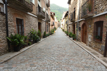  street in the old town Osor, La Selva, Girona province, Catalonia, Spain