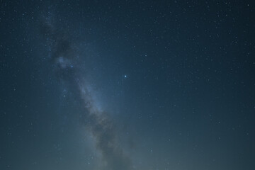 A vibrant depiction of a galactic black hole with swirling colors