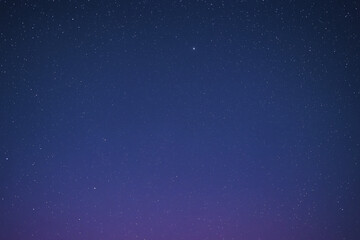 A striking illustration of a galactic black hole with vibrant colors