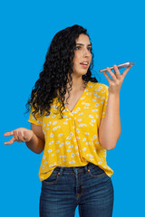 Woman talking on smartphone sending voice message