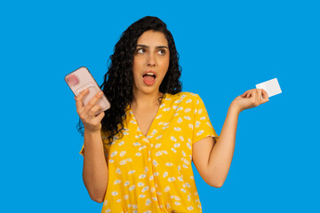 Woman feeling shocked receiving unexpected online shopping bill