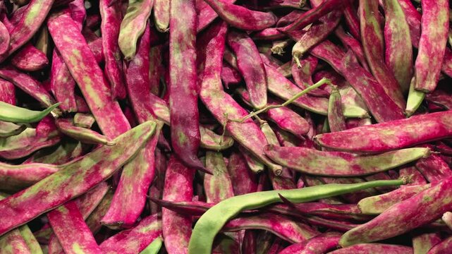 Red bean pods on display at a food market, concept of harvest. High quality 4k footage