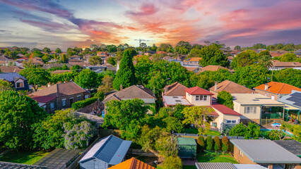 Aerial Panorama Drone View of a inner western Sydney Suburb of Ashbury Urban Sprawl and the terracotta roof tops streets and trees of Suburban Sydney  NSW Australia
