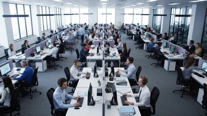 A high-angle time-lapse of a busy call center, showing the rhythmic activity of a diverse team of customer service agents - Powered by Adobe