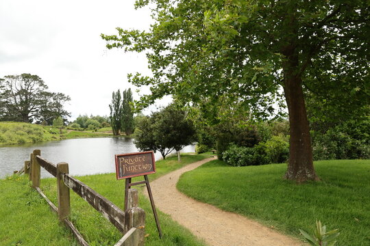 Private function sign by lakeside path