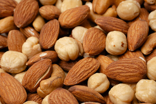 Nuts close-up. Almonds, cashews, hazelnuts. Product rich in minerals and vitamins. Healthy eating. Snack.	 - Powered by Adobe