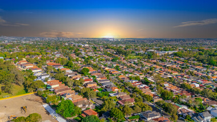 Aerial Panorama Drone View of a inner western Sydney Suburb of Ashbury Urban Sprawl and the terracotta roof tops streets and trees of Suburban Sydney  NSW Australia
