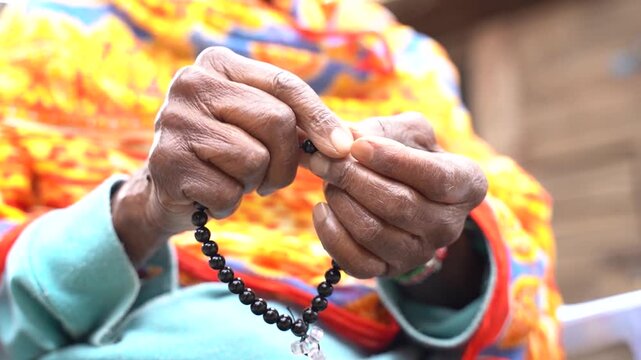 Muslim Women Praying Salat And Counting Beads On Eid Al-Fitr.