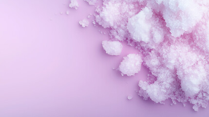 A pile of pink salt on a pink background