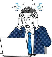 Man in suit looking stressed at a laptop with hands on head