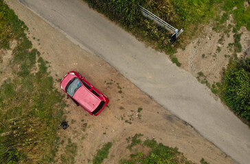 Car parked on mud track in middle of nowhere