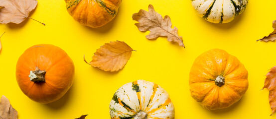 Autumn composition. Pattern made of dried leaves and other design accessories on table. Flat lay, top view