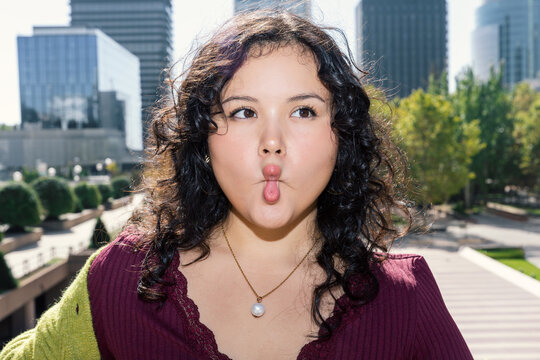 Authentic urban lifestyle of a young woman in the city