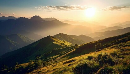 A vast landscape of layered mountain ranges bathed in the warm glow of the setting sun.