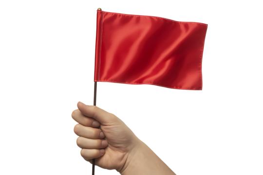 A hand holds a vibrant red flag waving against a stark black background.