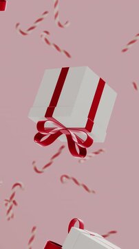 Vertical 3d Christmas New Year gifts red ribbon bow candy canes falling loop animation floating pink background pastel festive winter elegant glossy shiny banner decoration merry greeting card mockup