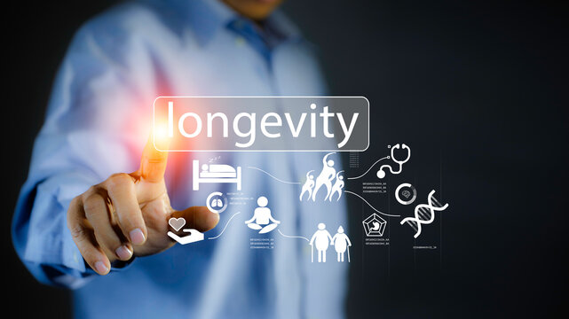 Longevity Concept with Hand Touching Digital Health Icons, Wellness, Medical Care, DNA, and Healthy Aging Technology.