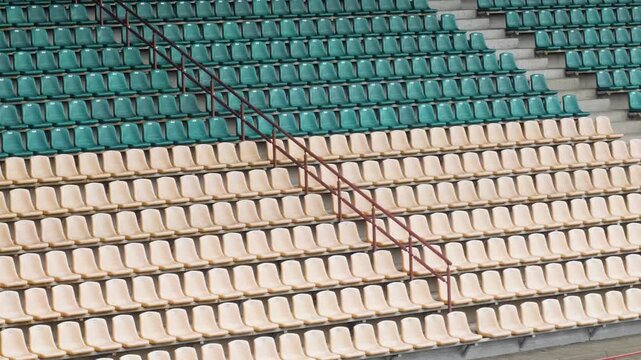 Empty green and white stadium seats. Empty stadium or race track seats