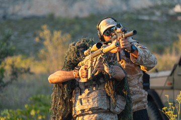 Airsoft enthusiasts in action with camouflaged gear