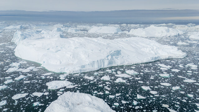 Majestic iceberg floating in Icefjord, Greenland
