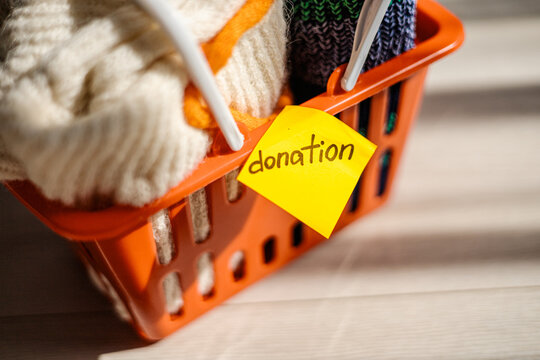 Donation basket with clothes and note