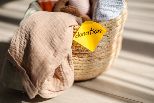 Donation basket with clothing and colorful label