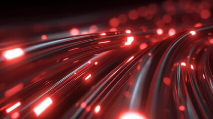 Fiber optic cables transmitting data with red light.