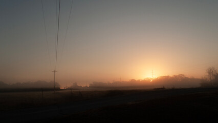 Autumn sunrise with power lines fresh new day