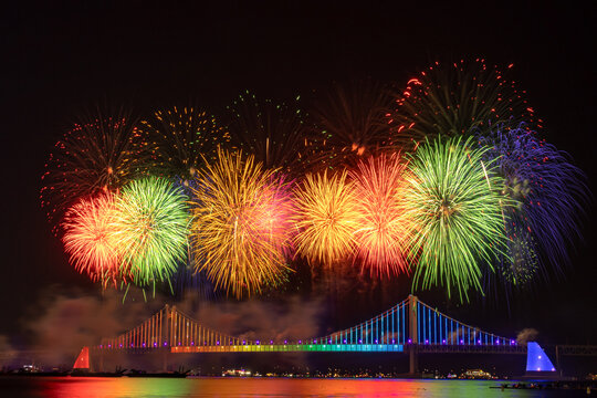 Bright colorful fireworks in the night sky over the Gwangan-li brige in Busan South Korea