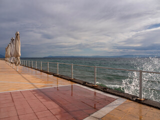 Obraz premium Clouds and stormy weather at Loutra Edipsou Spa resort on Evia Island in Greece