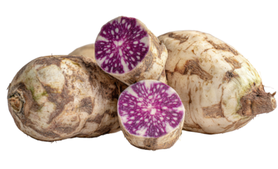 Whole and halved root vegetables with vibrant purple interiors