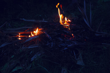 burning candles on a black background